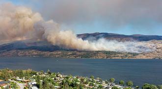 Photo of smoke from a forest fire near Pearchland British Columbia Canada