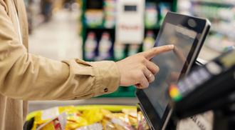 Purchasing at self-service checkout in supermarket