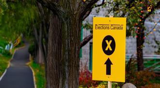 A sign at Ottawa directs voters to polling stations.