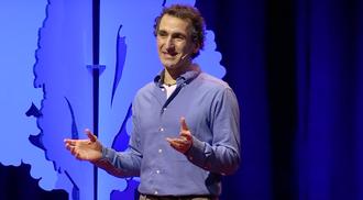Photo of Dr. Simon Donner on stage at Tedx