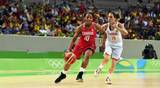 Canada&#039;s shooting guard Nirra Fields (Left) works around Spain&#039;s guard Anna Cruz during a Women&#039;s round Group B basketball match between Spain and Canada at the Youth Arena in Rio de Janeiro on August 14, 2016 during the Rio 2016 Olympic Games.