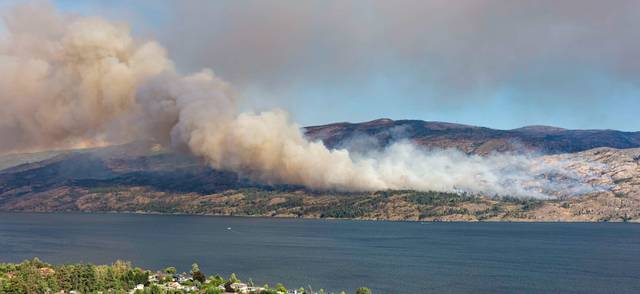 Photo of smoke from a forest fire near Pearchland British Columbia Canada.