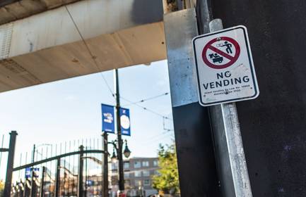 A City of Vancouver sign that says &quot;No Vending&quot; is posted along Commercial Drive
